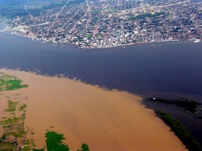 Confluence of the Amazon River with the Tapajós River in Santarem, Brazil.