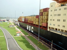 A boat going through the Panama Canal.