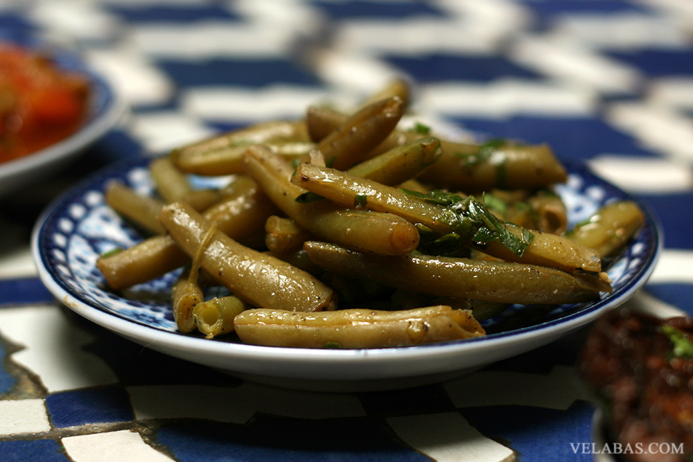 Green beans, slightly sweet, lukewarm and served before the main course