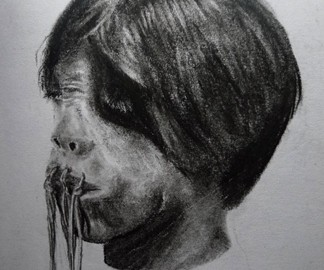 Travel sketching of a shrunken head in Ecuador